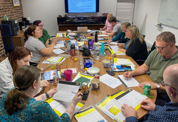 A large Dawleys team meeting
