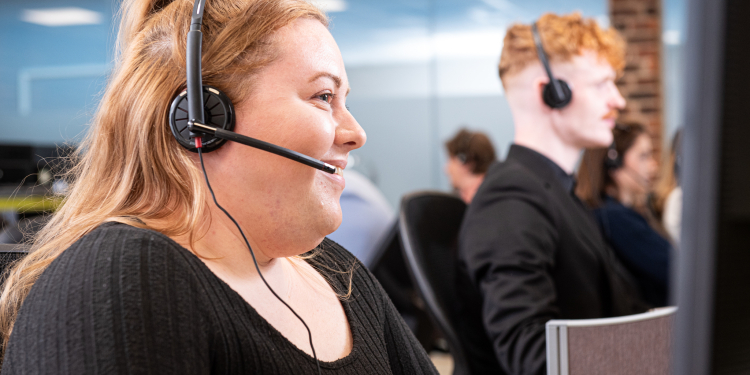 A member of the lead qualification team calling a customer